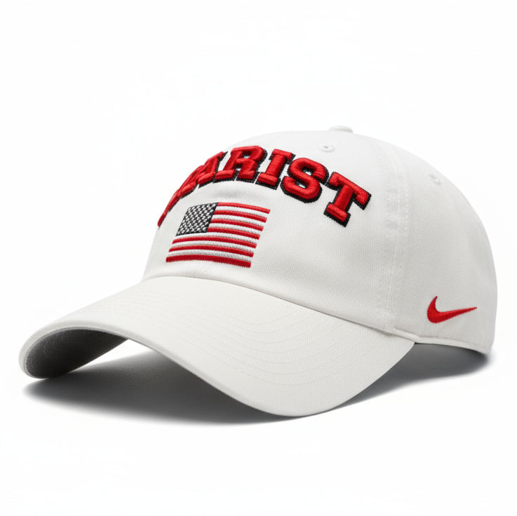 White baseball hat with red "Marist" text and American flag on a white background